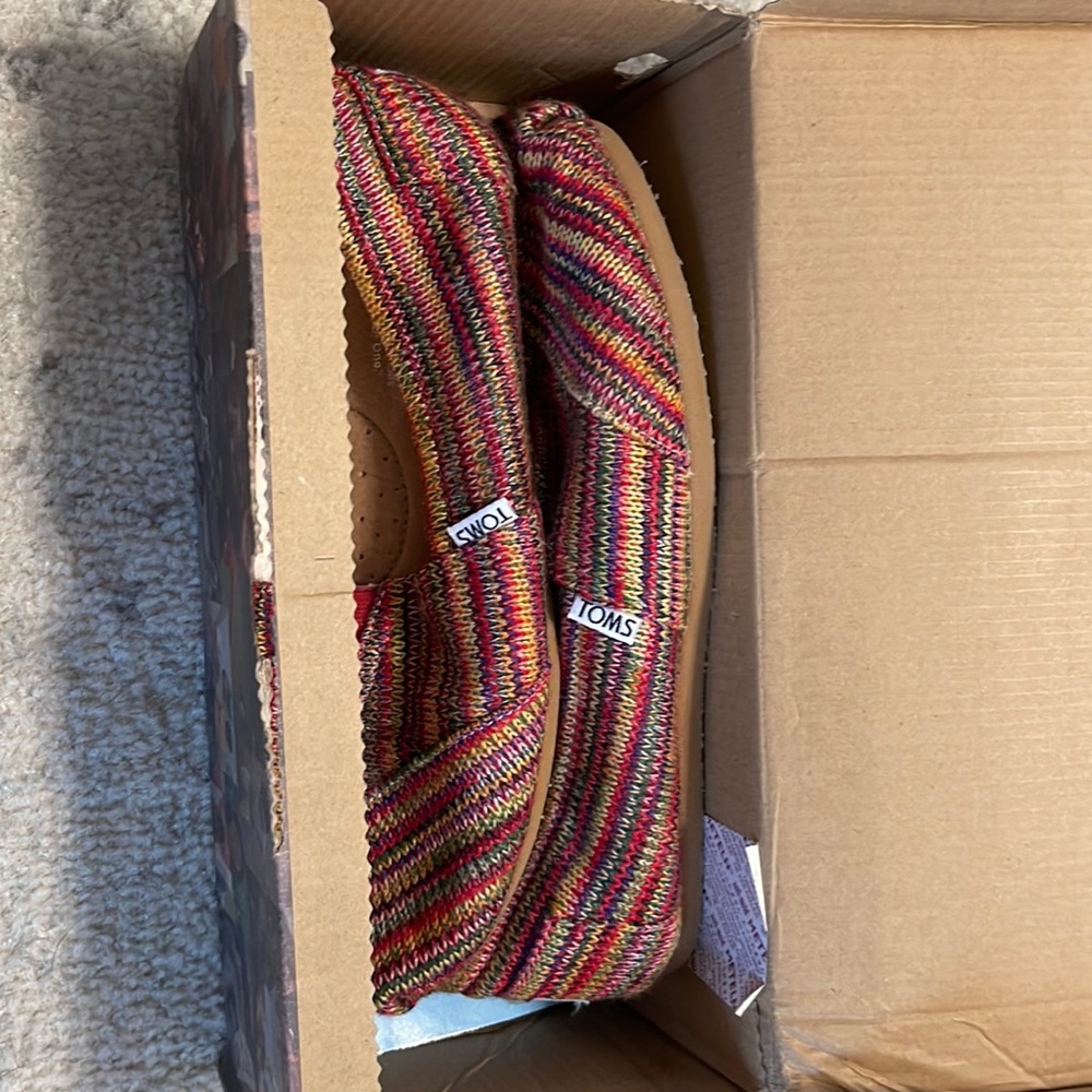 Tom’s shoe. Never worn. Still in box. Size 8.5